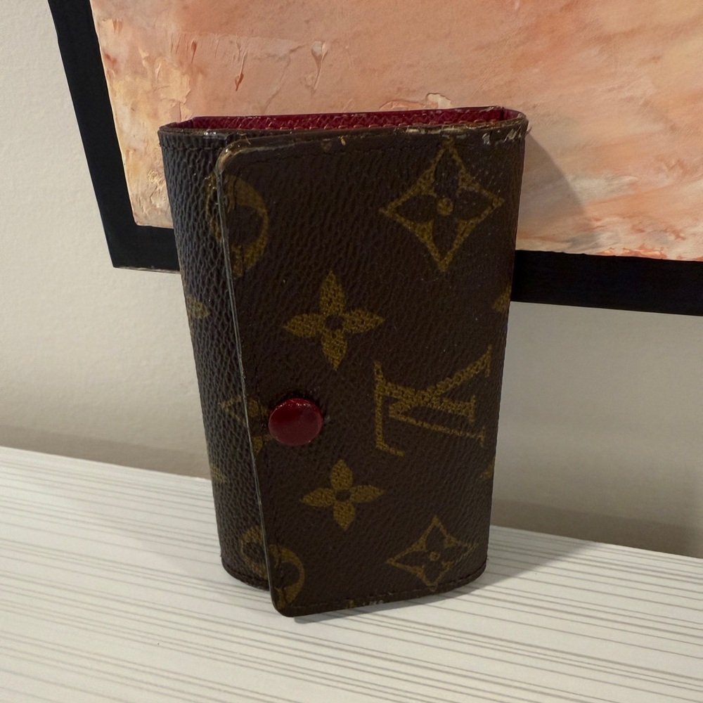 Authentic Louis Vuitton Monogram 6 Key Holder in Magenta